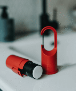Nomad Face Red Mars – protector solar mineral en formato cápsula recargable, resistente y portátil.