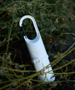 Nomad Face Bunker White Snow – protector solar extremo SPF50+ entre vegetación, resistente al calor y condiciones outdoor.