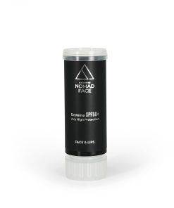stick spf50+ mejor-proteccion-solar-facial Una barra de protector solar negra con la etiqueta "rostro nómada extremo" con spf50+ para rostro y labios, exhibida sobre un fondo blanco.