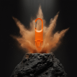 "Nomad Face Bunker Orange Tiger – envase resistente con clip mosquetón, diseñado para deportes de montaña y aventura."