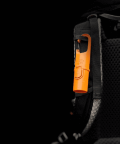 "Bunker Nomad Face Orange Tiger – envase técnico reutilizable y recargable, diseñado para condiciones extremas de montaña."