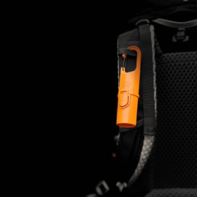 "Bunker Nomad Face Orange Tiger – envase técnico reutilizable y recargable, diseñado para condiciones extremas de montaña."
