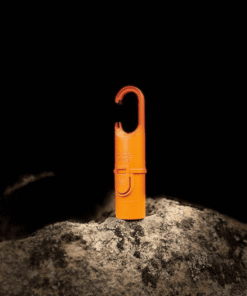 "Protector solar Nomad Face Orange Tiger – diseño compacto y funcional para uso en montaña, nieve o expediciones outdoor."